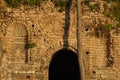 Fragment of an ancient Byzantine wall and an arch in the wall